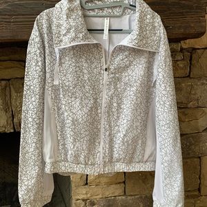 white and silver Athletic jacket